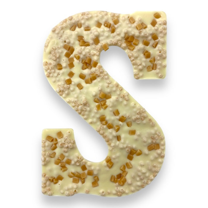 Luxury White chocolate letter S with puffed rice and caramel cubes